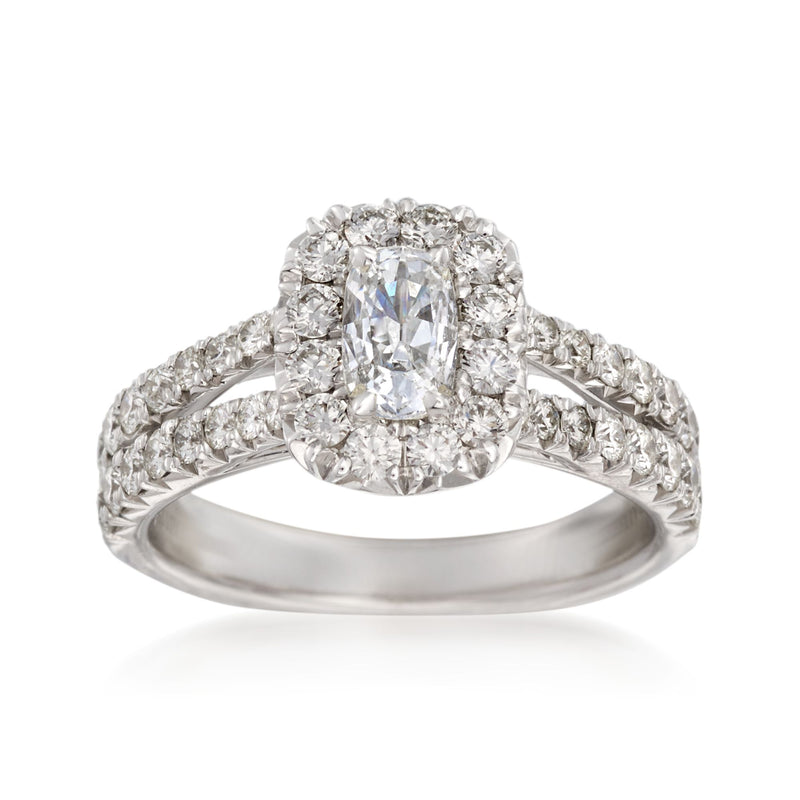 18kt white gold diamond engagement ring with oval center and round halo