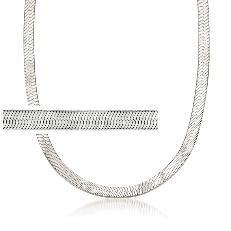 Sterling silver herringbone necklace with flat oval links, curved close-up