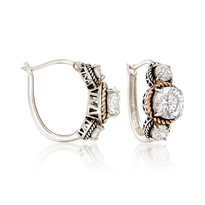 Sterling silver three-stone CZ drop earrings with round stones, gold-tone accents