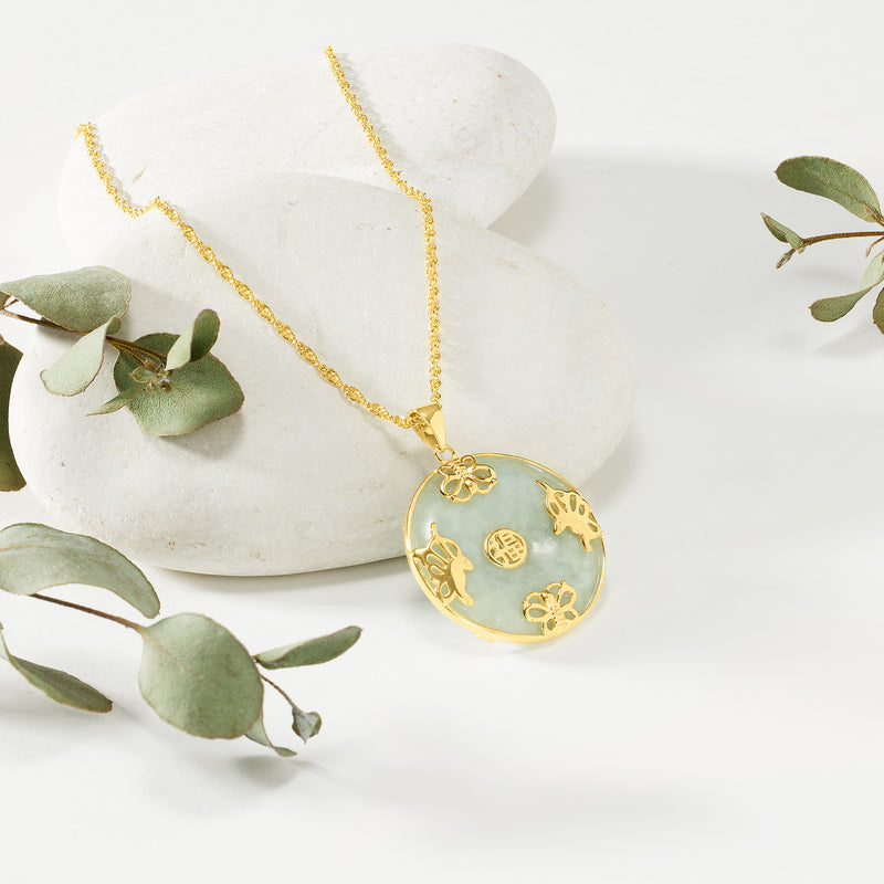 Gold-over-sterling jade round pendant necklace with butterfly cutouts and floral bail