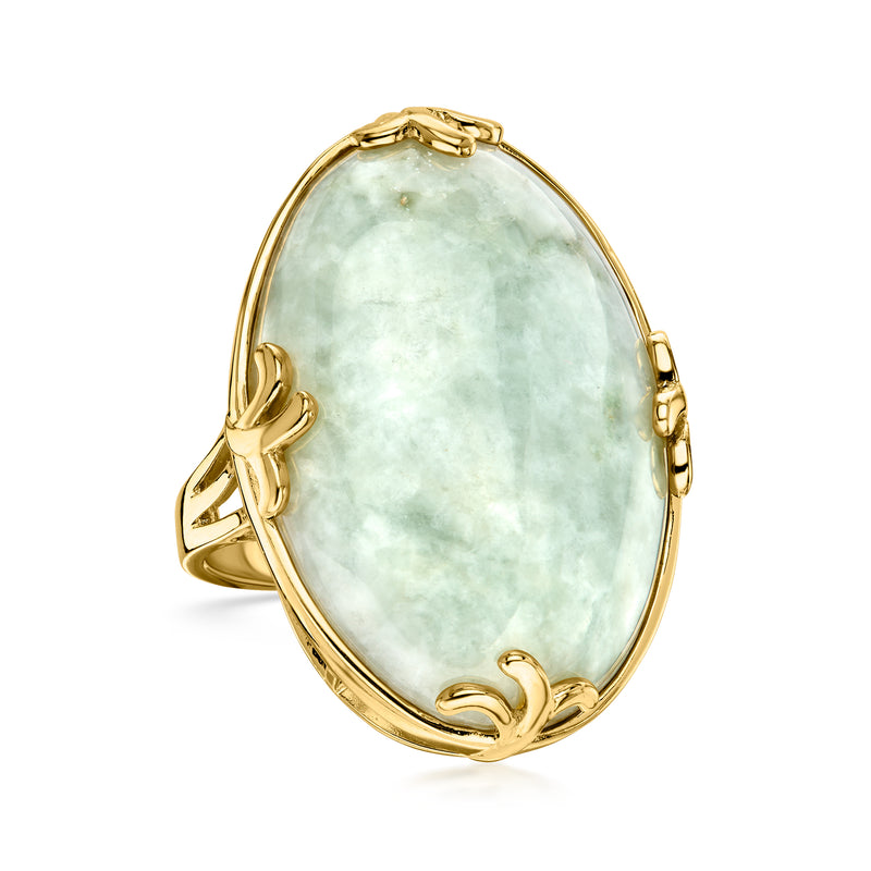 Oval jade ring with gold-tone frame and leaf motifs