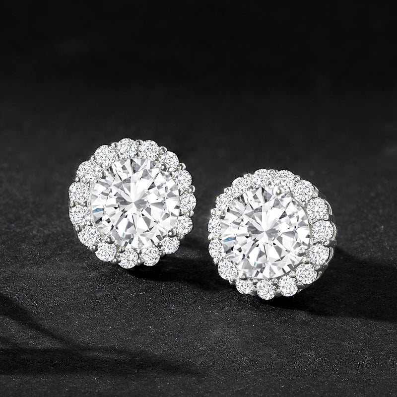 Round CZ halo stud earrings in sterling silver, close-up on front