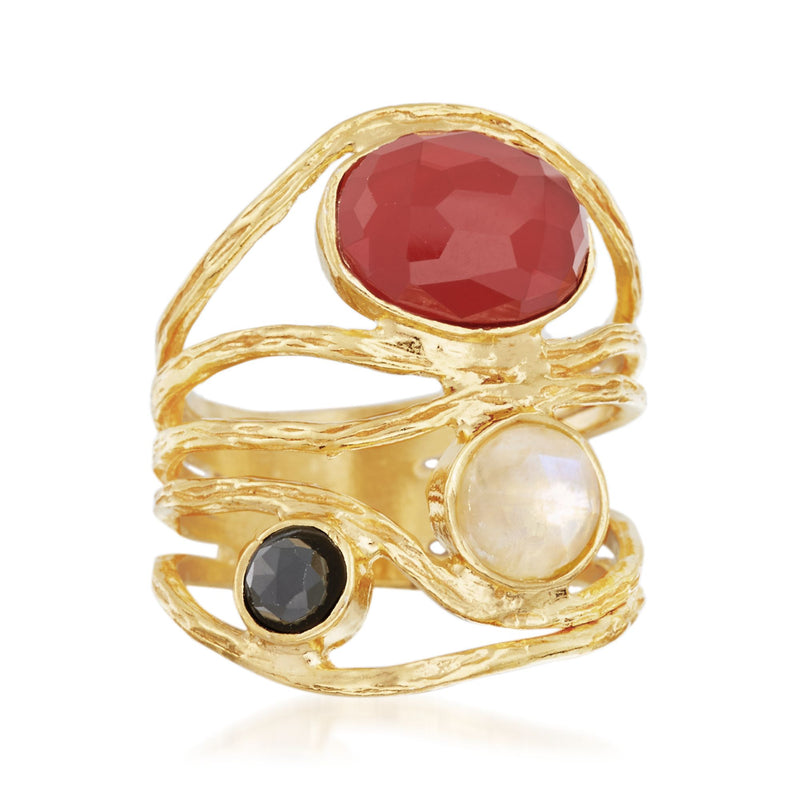 Gold-tone multi-stone ring with oval red, round white, and black stones