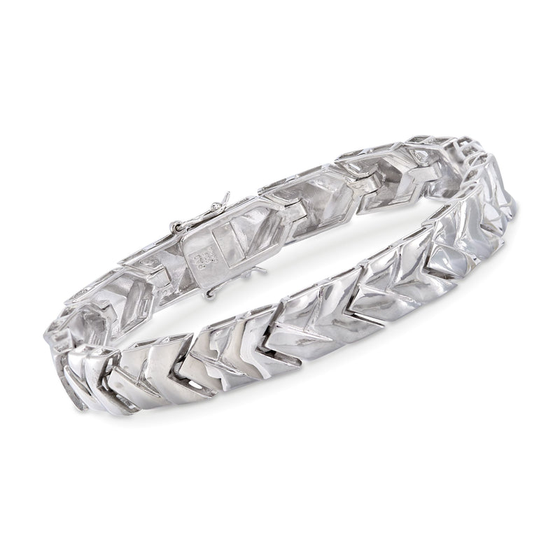 Sterling silver chevron link bracelet with hinged clasp and polished geometric pattern