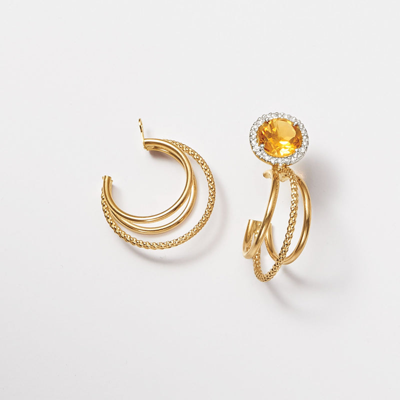 14kt yellow gold hoop earring jacket with round orange center stone and halo