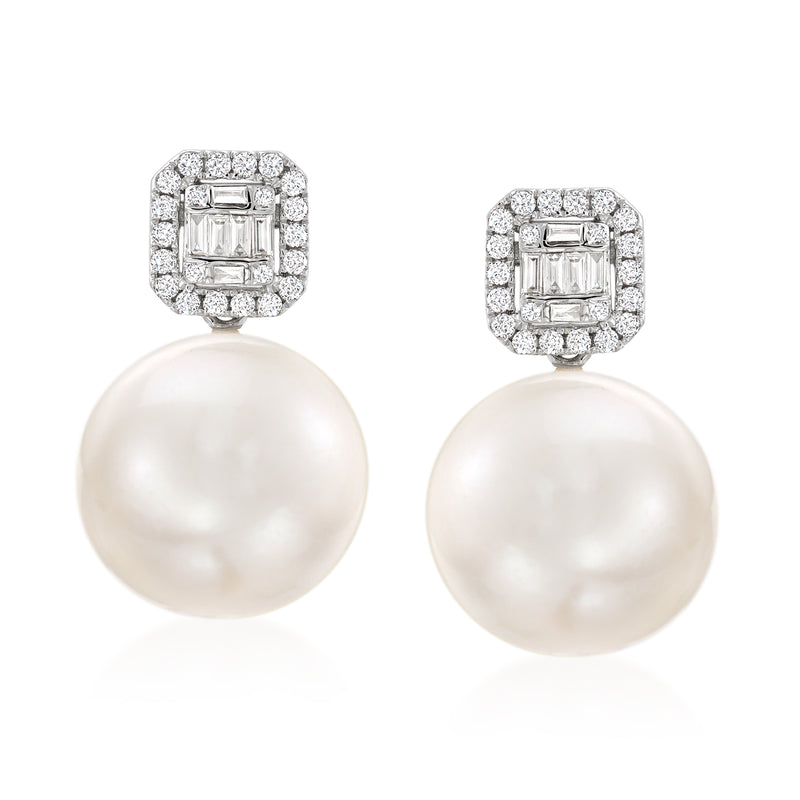 White gold drop earrings with halo diamond tops and large white cultured pearls