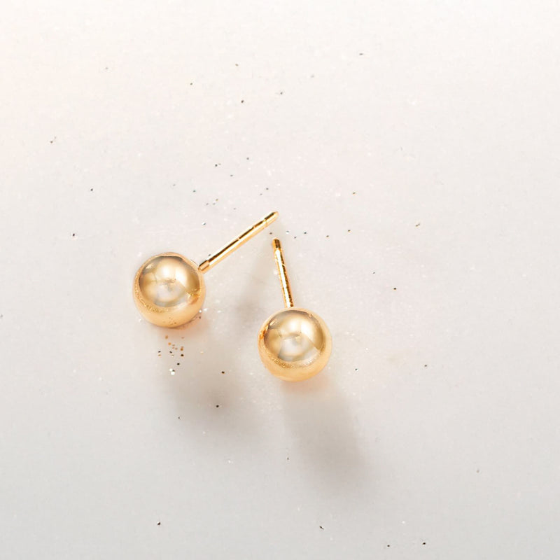 Yellow gold ball stud earrings with round polished face and thin posts