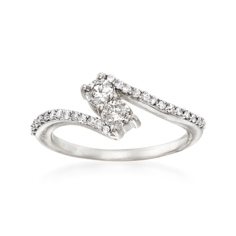 14kt white gold toi et moi diamond ring with two round center stones and pave band
