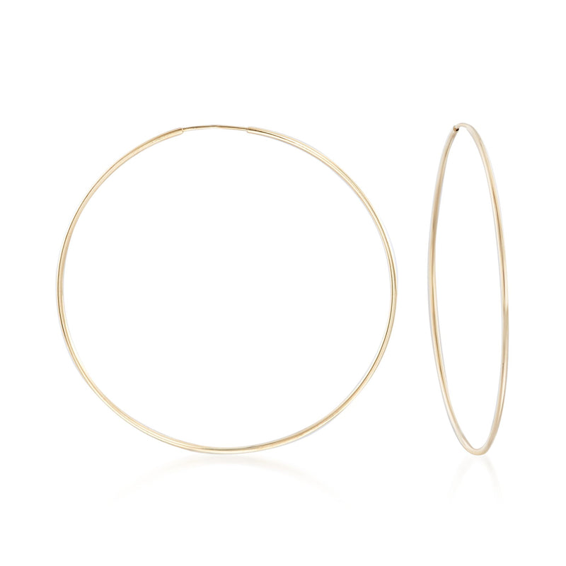 Slim 14kt yellow gold endless hoop earrings, thin circular profile