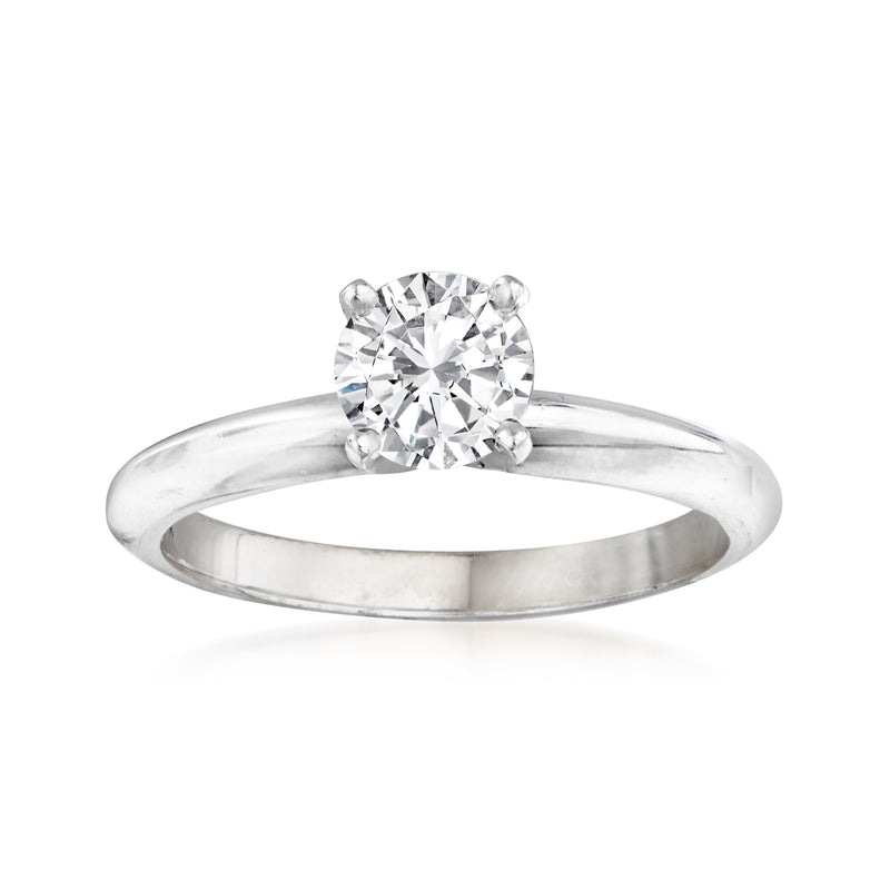 14kt white gold solitaire engagement ring with round diamond center stone