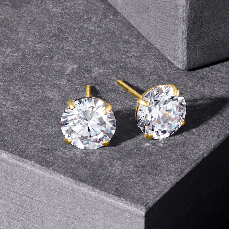 Round CZ stud earrings in 18kt yellow gold with prong-set clear stones