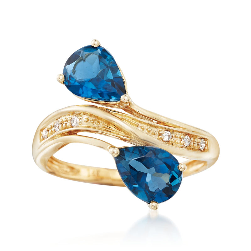 14kt yellow gold bypass ring with two London blue topaz and diamond accents