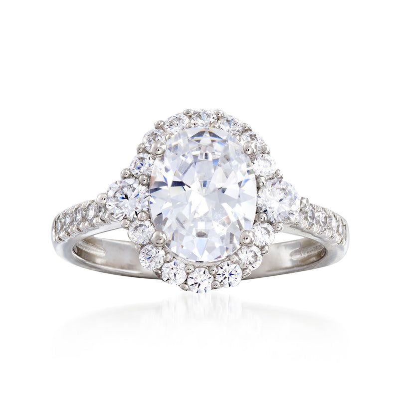 Sterling silver CZ ring with round center stone and halo of small clear stones