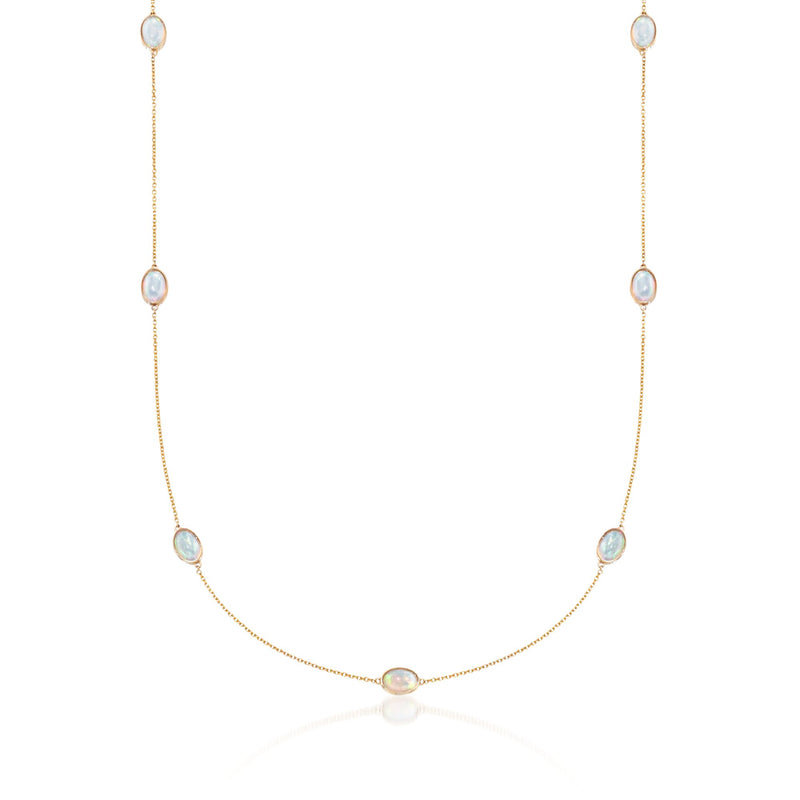 14kt yellow gold opal station necklace with round blue opal cabochons