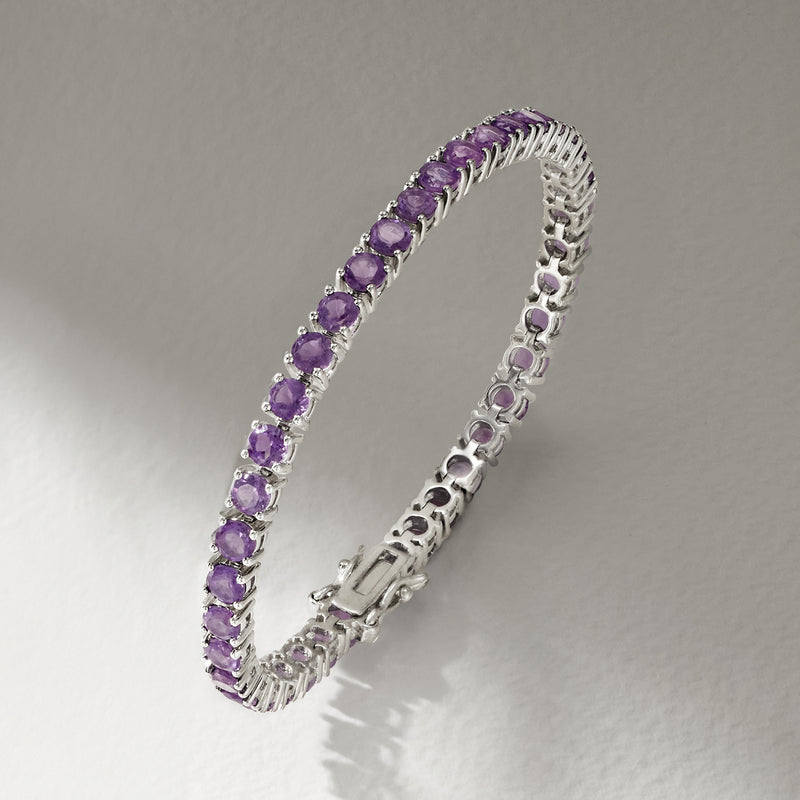 Sterling silver amethyst tennis bracelet with purple gemstone row, side view