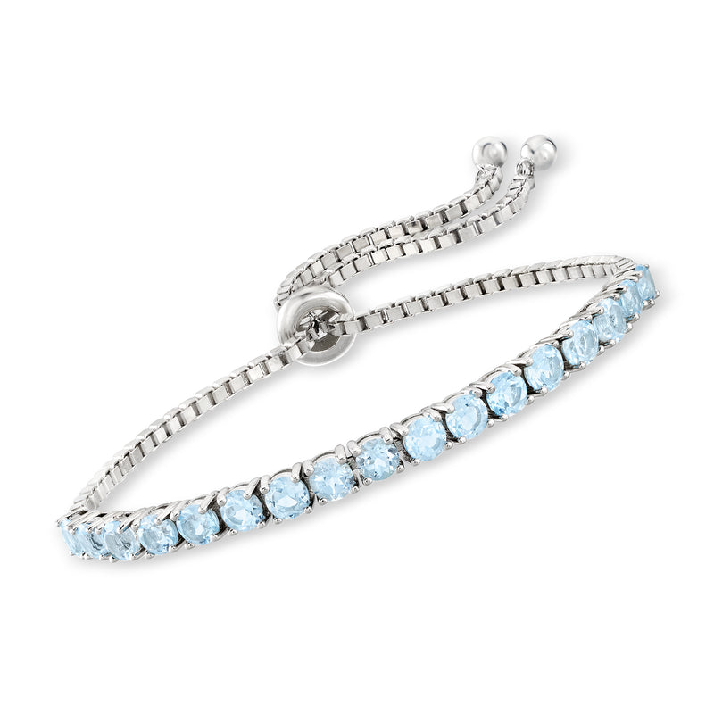 Sterling silver bolo bracelet with light blue oval topaz row