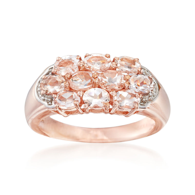 Rose gold cluster ring with oval morganite-style gemstones in a halo setting