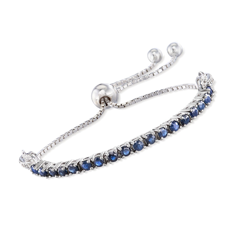 Sterling silver bolo bracelet with blue sapphire-style stones and white zircon accents