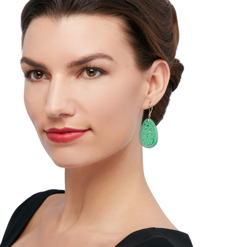 Green carved jade teardrop drop earrings in 14kt yellow gold leverback style