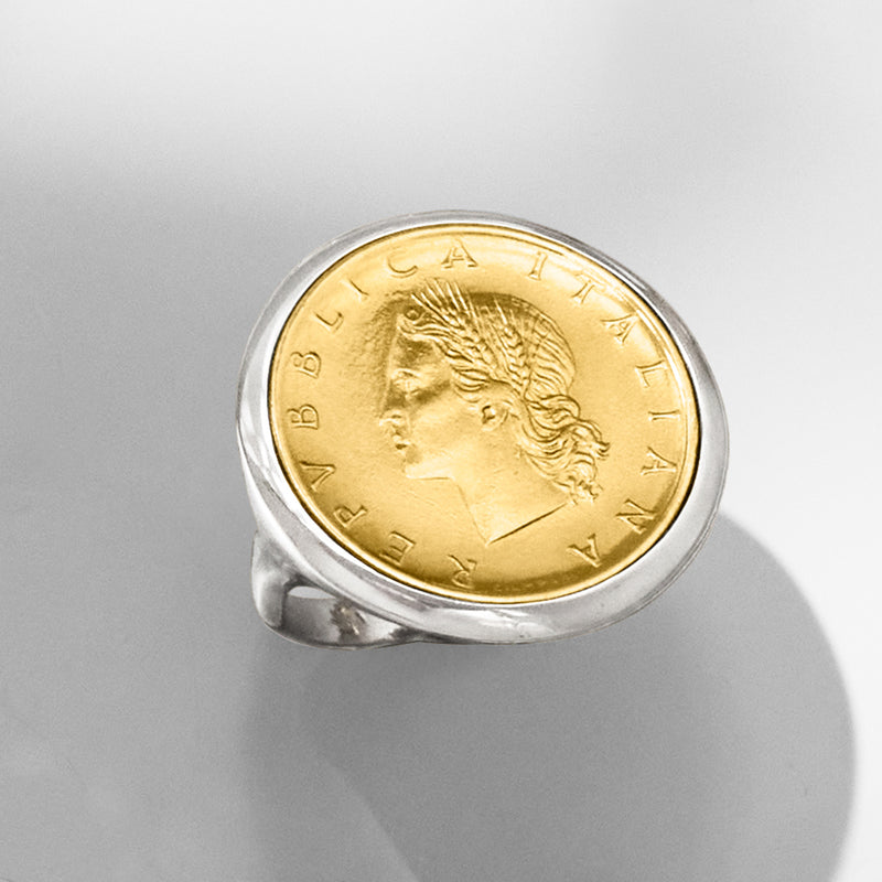 Sterling silver coin ring showing gold-colored 20 Lira profile portrait, close up