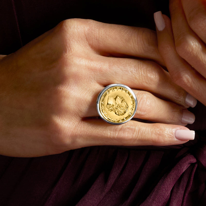 Sterling silver 20 Lira coin ring worn on finger, gold-colored coin face visible
