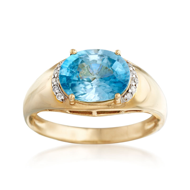 Blue zircon ring with diamond accents in 14kt yellow gold
