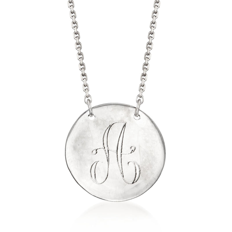 Sterling silver personalized disc necklace with a round pendant engraved letter