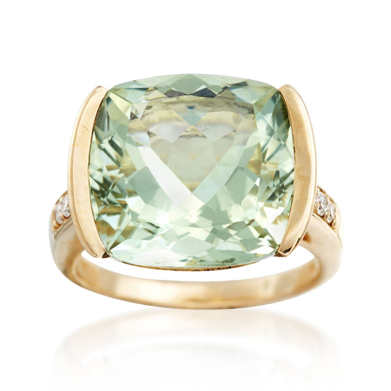 Yellow gold ring with green amethyst cushion center and diamond accents