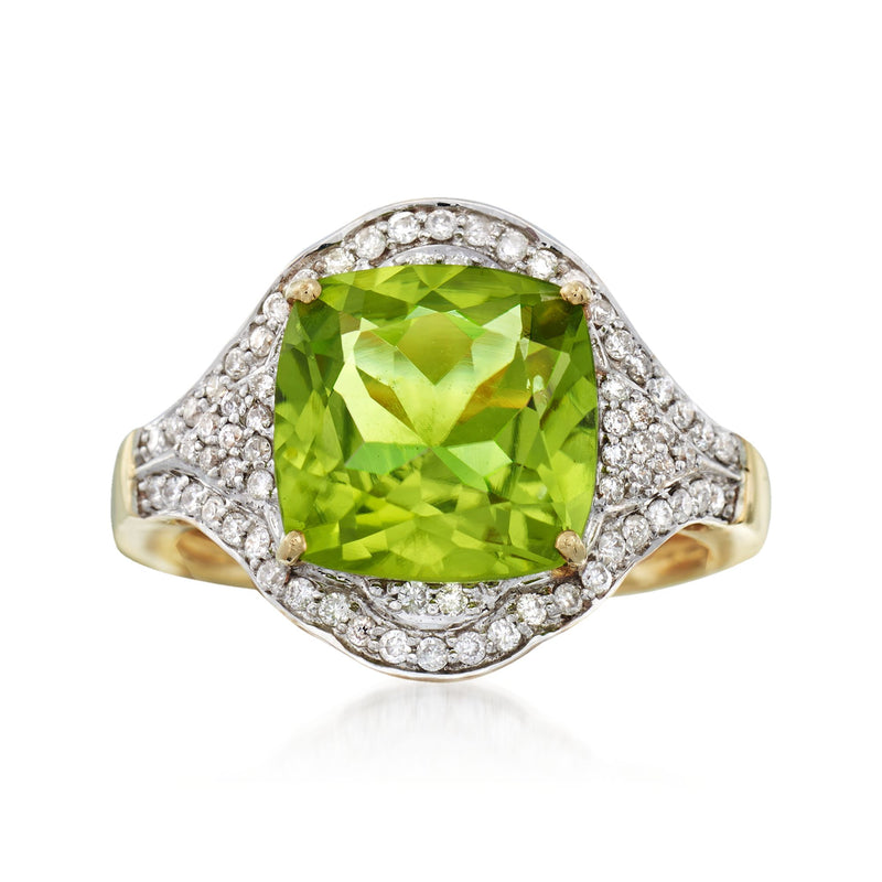 Peridot and diamond ring in 14kt yellow gold, oval green center with diamond halo