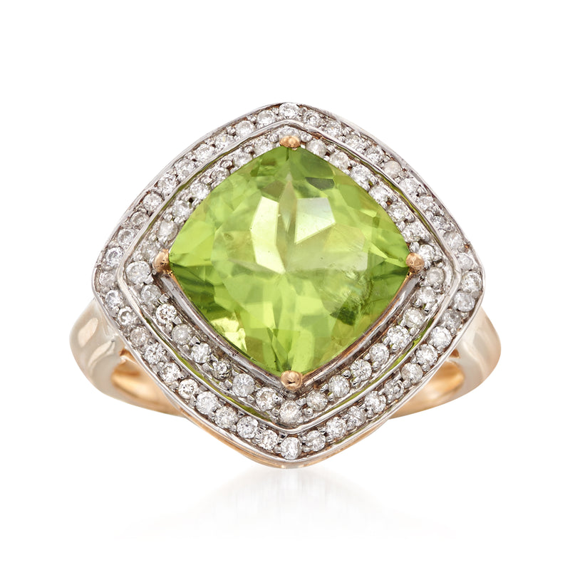 Peridot and diamond halo ring with cushion-cut green gemstone in 14k yellow gold