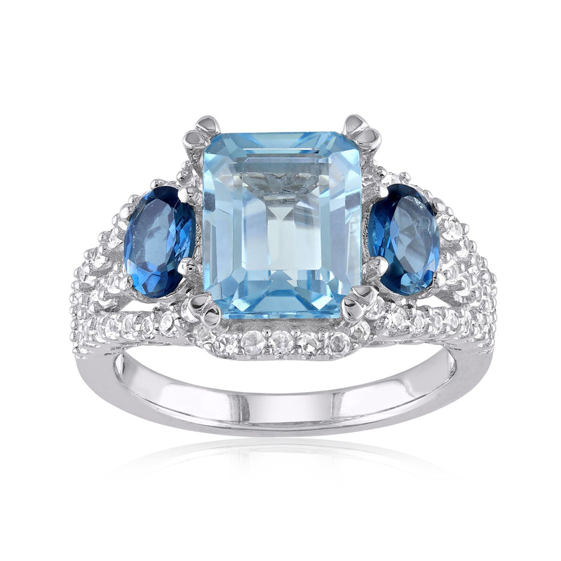 Sterling silver ring with large sky-blue square gemstone, three blue side stones, white stone halo