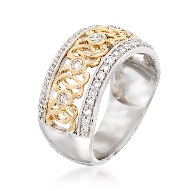 Two-tone gold diamond swirl ring with sparkling stones and round center gems on side
