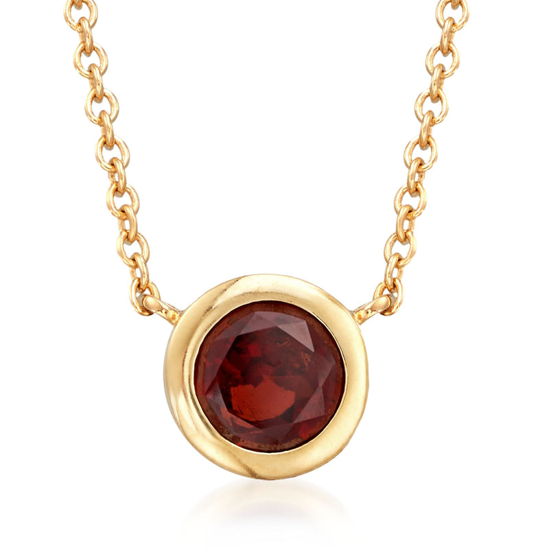 Gold bezel-set garnet pendant necklace with round red gemstone and link chain