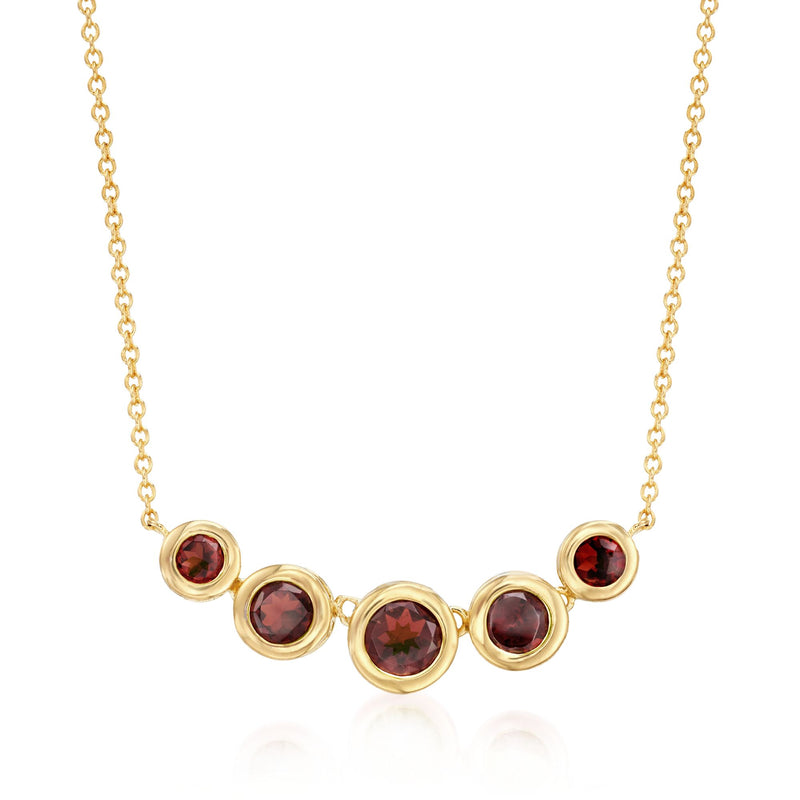 Gold link necklace with round bezel-set red garnet stones