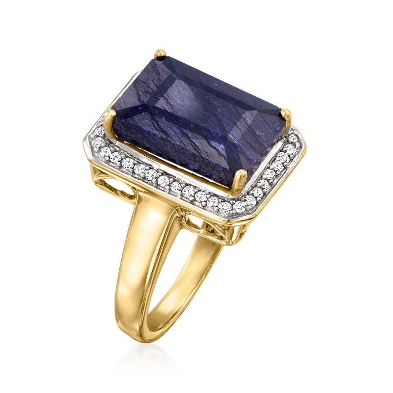 14kt yellow gold sapphire and diamond ring with raised blue sapphire center and diamond border