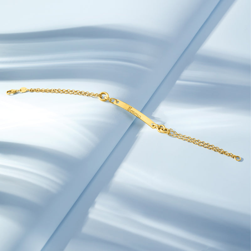 14kt yellow gold link bracelet with engraved nameplate and spring-ring clasp