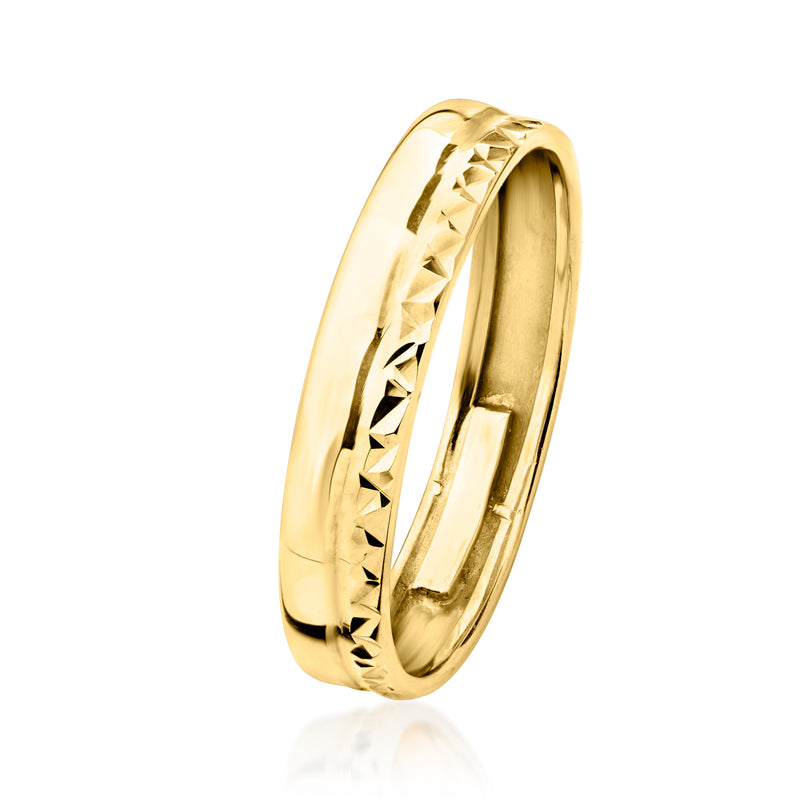 Yellow gold ring side view with diamond-cut texture on band