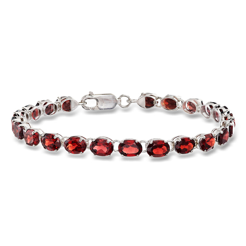 Sterling silver bracelet with oval red garnet stones and hinged clasp