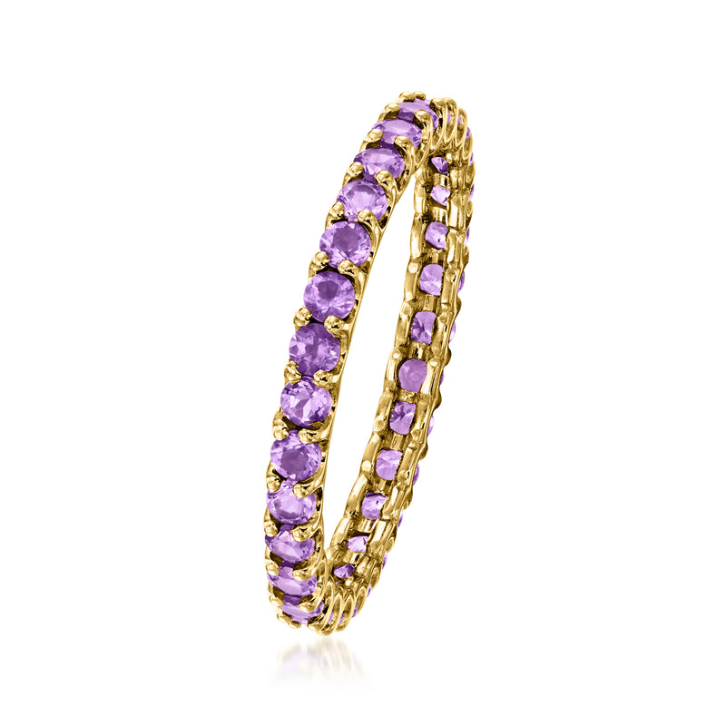14kt yellow gold amethyst eternity band with round purple stones on the band edge