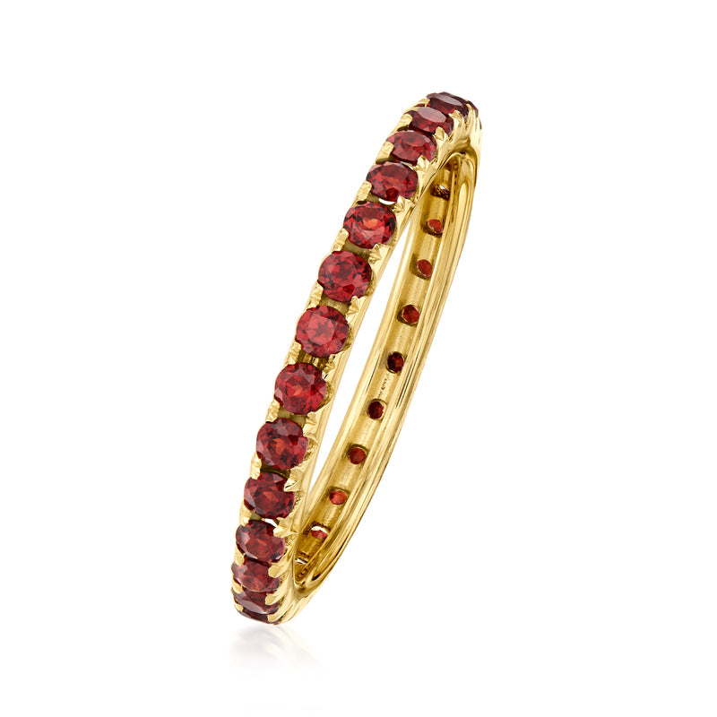 14kt yellow gold garnet eternity band side view with red stones and pierced gallery