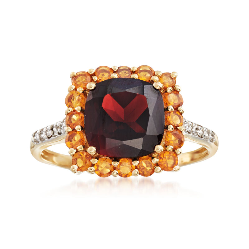 14k yellow gold ring with dark garnet center, citrine halo and diamond accents