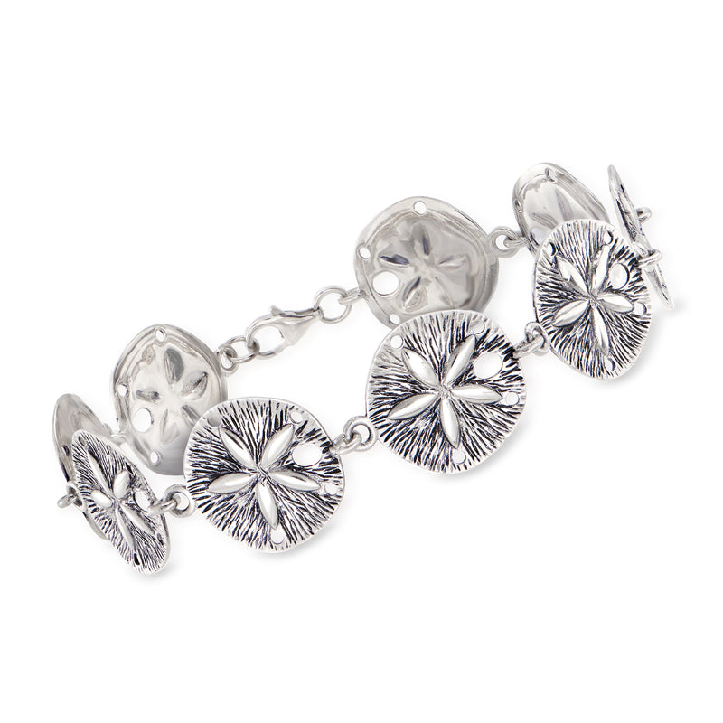 Sterling silver sand dollar charm bracelet with multiple round medallions and lobster clasp