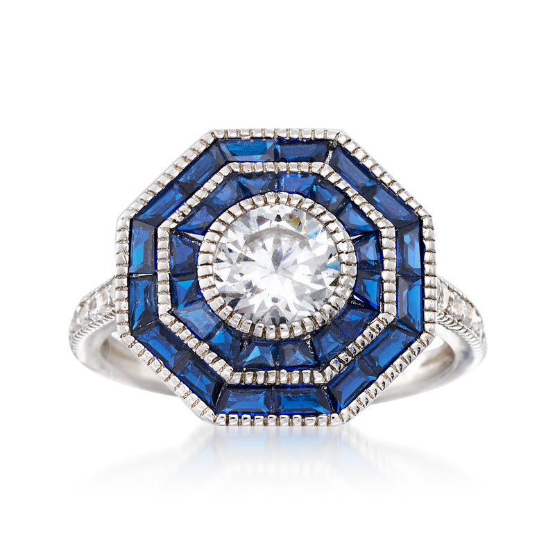 Sterling silver ring with blue center CZ and halo, baguette accents