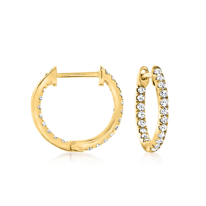 14kt yellow gold huggie hoop earrings with diamond accents on inner and outer edges