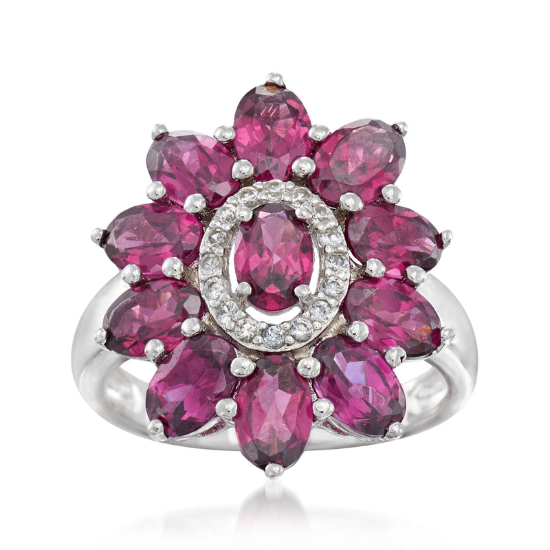 Sterling silver flower ring with pink rhodolite garnet petals and white zircon halo