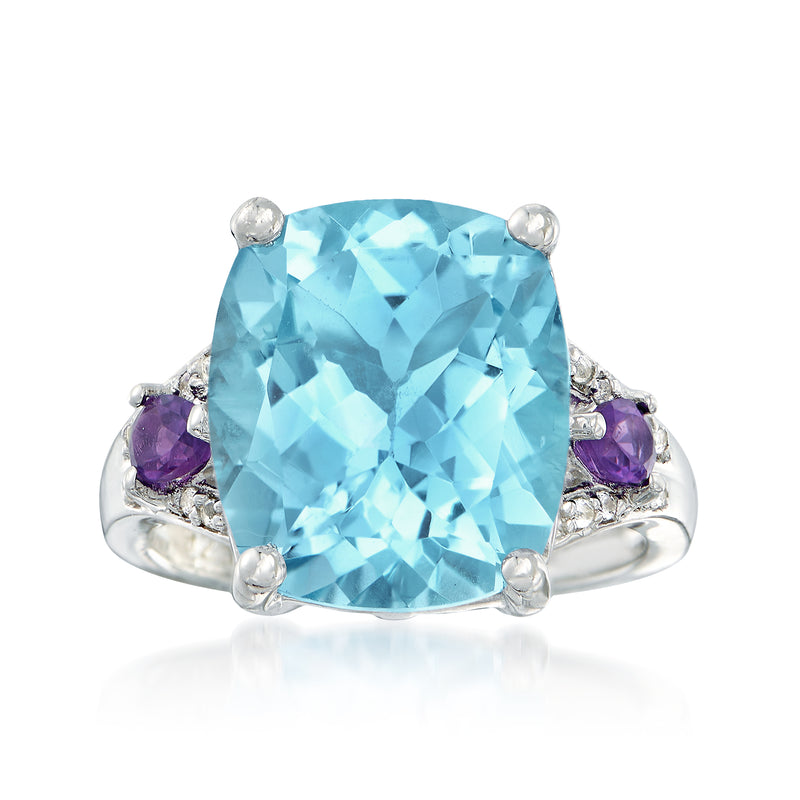 Sterling silver ring with large light blue cushion-cut gemstone and purple side stones