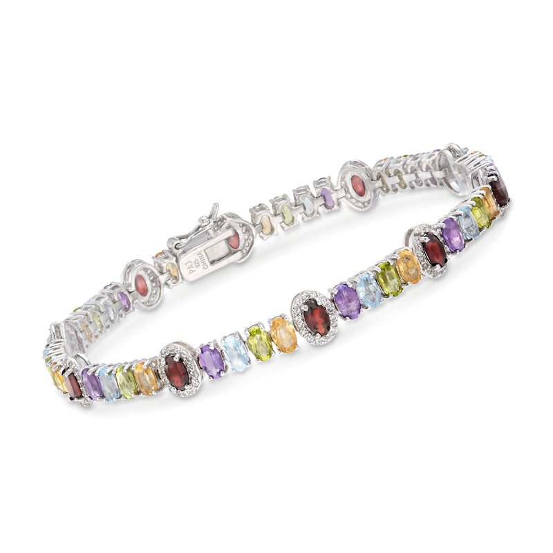 Sterling silver station bracelet with multicolor oval-cut stones and hinged clasp