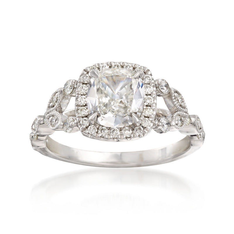 18kt white gold diamond engagement ring with large center cushion-cut stone and halo
