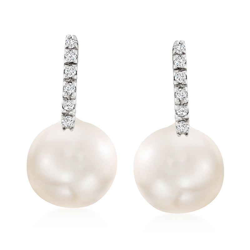 Pearl huggie hoop drop earrings with diamonds in 14kt white gold