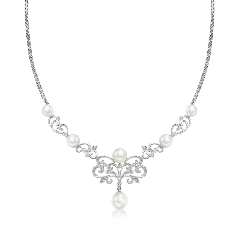Sterling silver necklace with cultured pearls and diamond scrollwork pendant